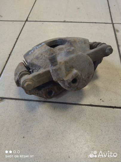 Суппорт тормозной передний левый Volkswagen Polo