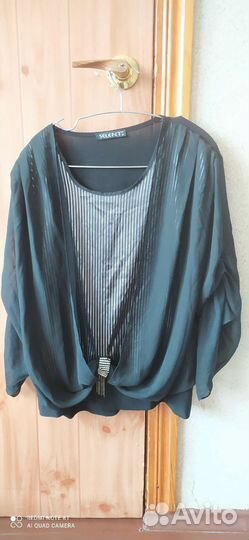 Вещи на женщину 50-54размер