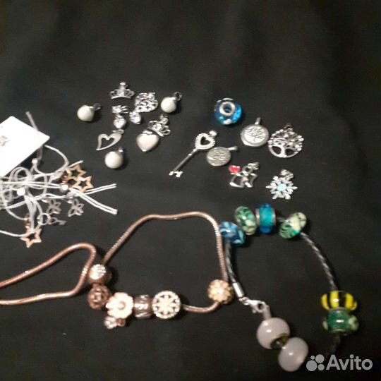 Отдам кулон новый серебро