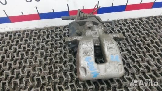 Суппорт тормозной задний правый volkswagen passat