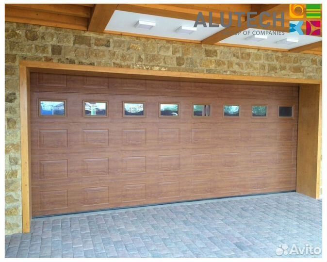 Секционные ворота для гаража alutech