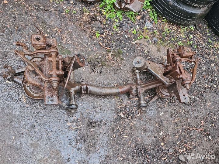 Передняя балка Шеви Нива