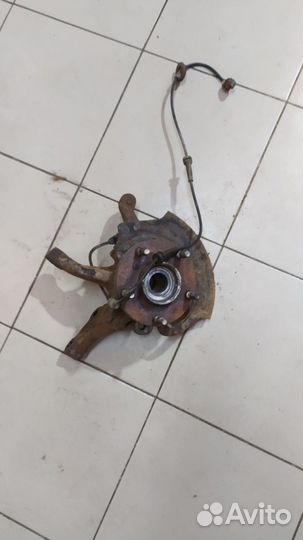 Кулак поворотный передний левый Nissan X-Trail T30