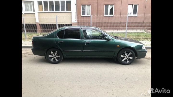 Nissan Primera 1.6 МТ, 1997, битый, 300 000 км