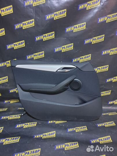 Обшивка двери передней левойBMW X1 E84