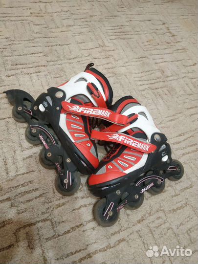 Роликовые коньки