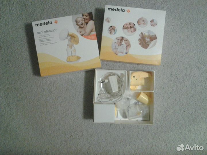 Молокоотсос medela mini electric