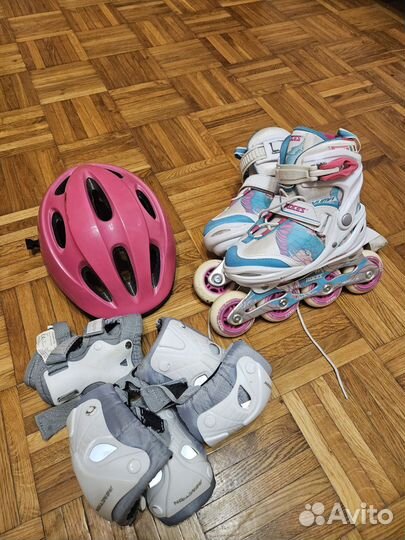 Роликовые коньки