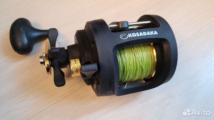 Катушка рыболовная мультипликаторная