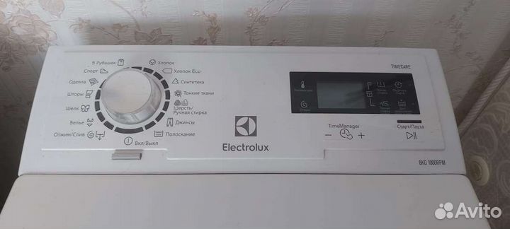 Стиральная машина Electrolux вертикальная