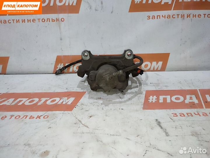 Суппорт тормозной передний левый Volkswagen Tiguan