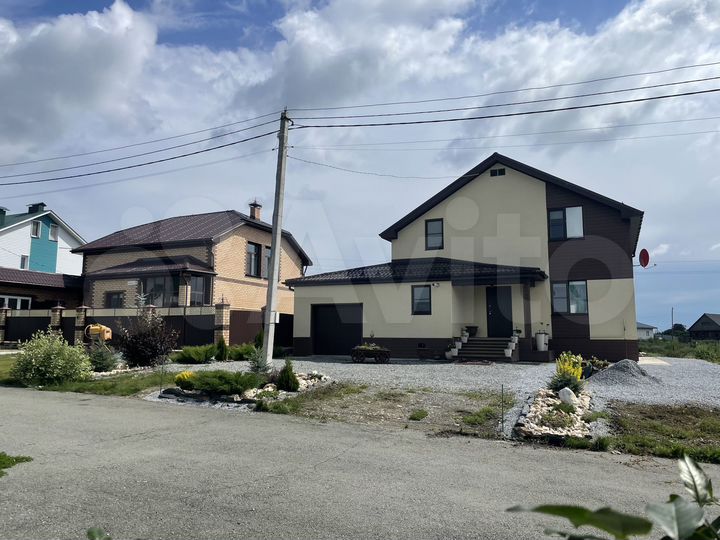 Дом 176 м² на участке 6,5 сот.