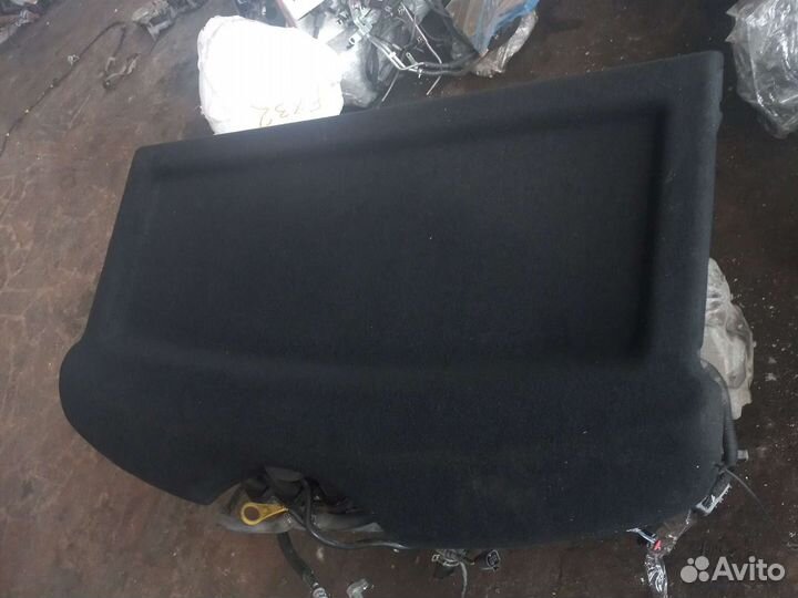 Задняя полка Шкода Рапид