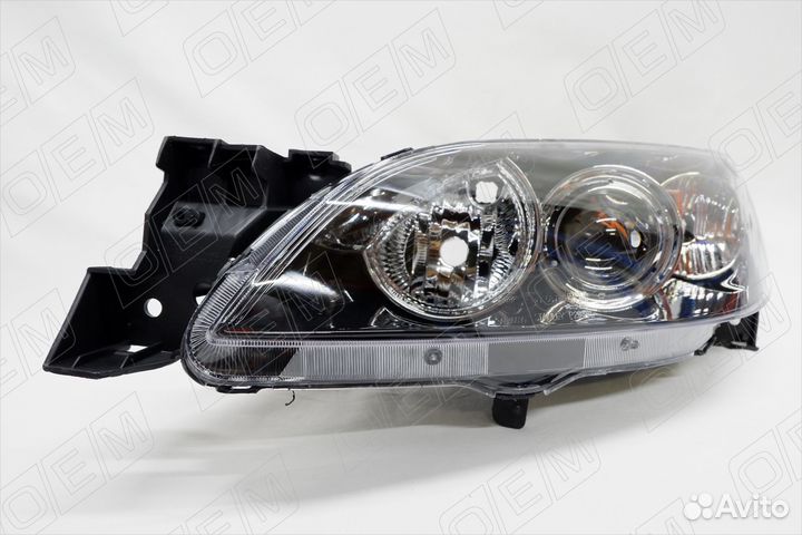 Фара левая Mazda 3 1 вк 2003-2009