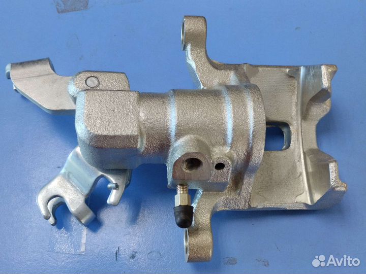 Тормозной суппорт задний левый Мазда 6 GG/GH