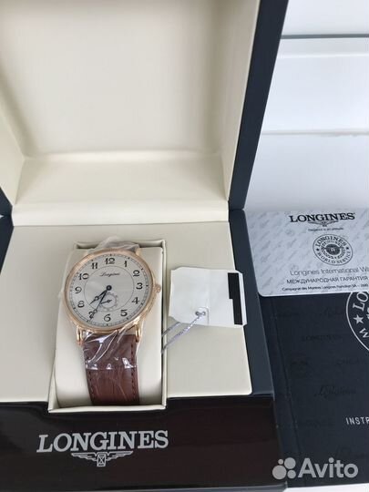 Мужские золотые часы Longines