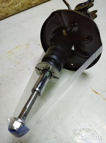 Амортизатор задний левый для Mazda 323F 1998-2003