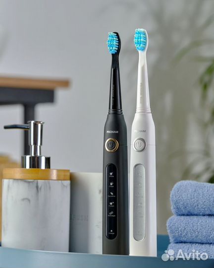 Электрическая зубная щетка