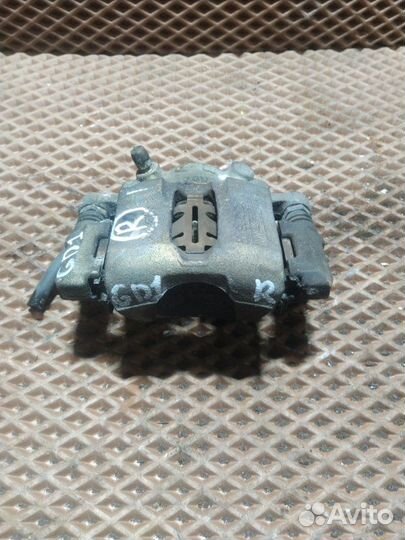 Суппорт тормозной передний правый Honda Fit GD1