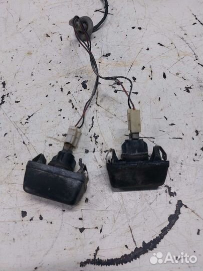 Фонарь подсветки номерного знака Mazda 323 BF