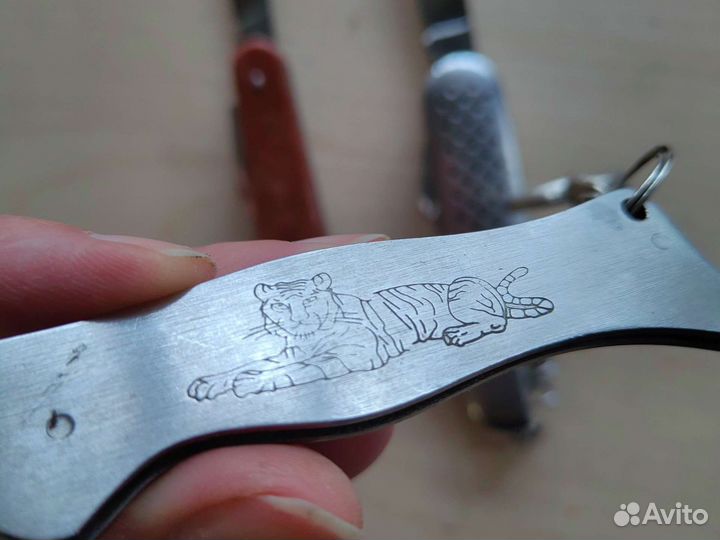 Нож складной брелок тигр