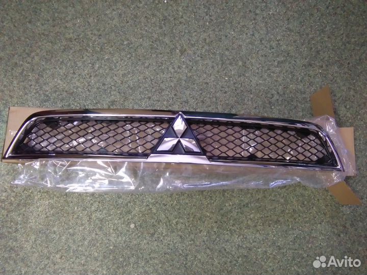 Митсубиси лансер 10 решетка радиатора бампер
