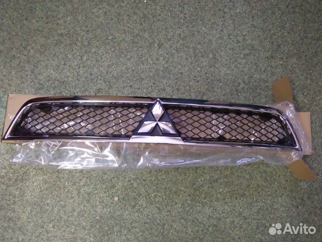 Митсубиси лансер 10 решетка радиатора бампер