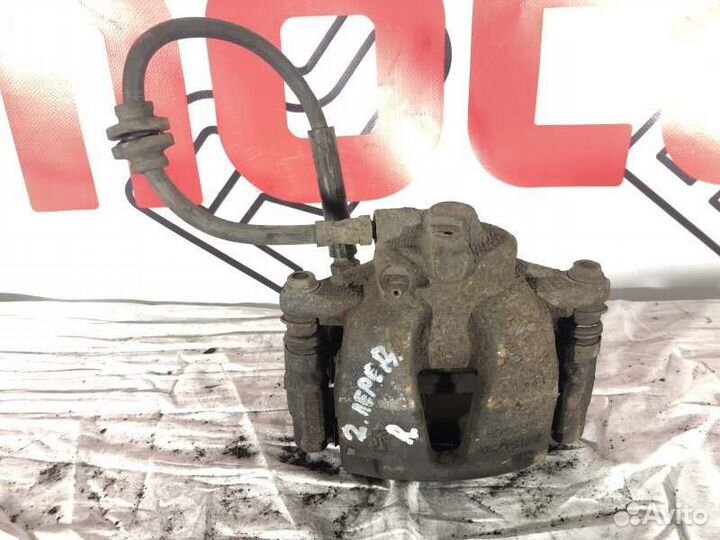 Суппорт тормозной передний правый Opel Corsa D