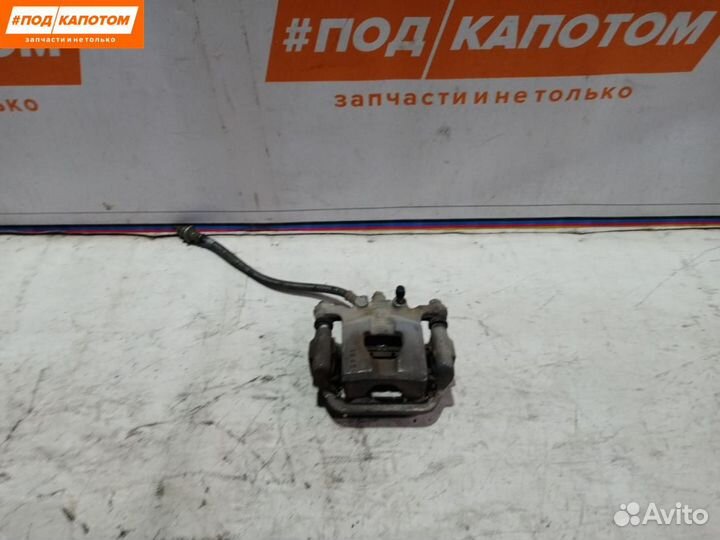 Суппорт тормозной задний левый Nissan Teana J32