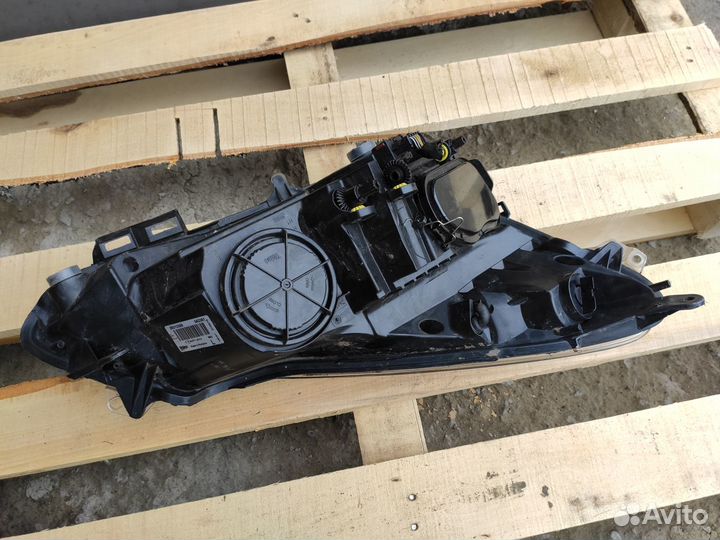 Фара левая Черная на Опель Corsa D Дорестайлинг