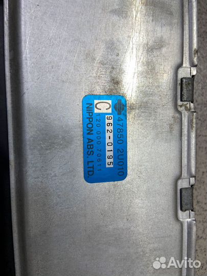 Блок управления abs Nissan Cube 1999 г