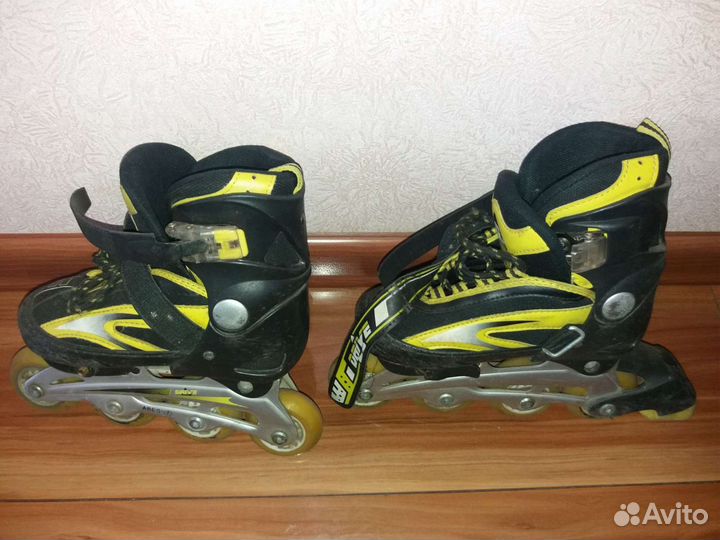 Роликовые коньки