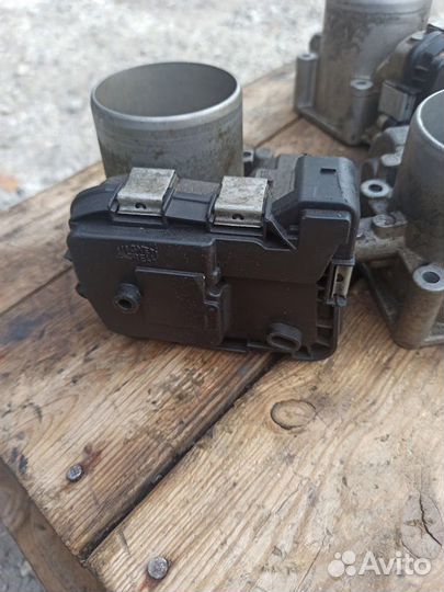 Заслонка дроссельная электрическая Шкода Карог