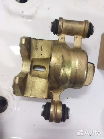 Суппорт в сборе с колодками