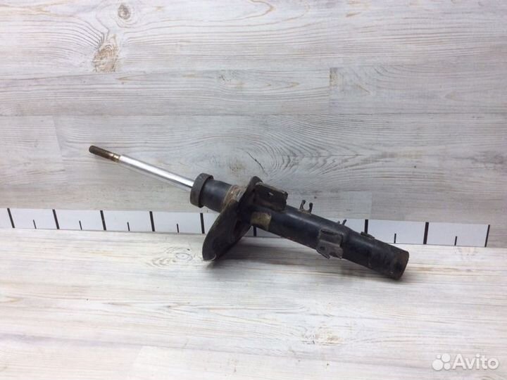 Амортизатор передний левый Peugeot 207 2006-2013