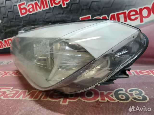 Фара левая BMW X1