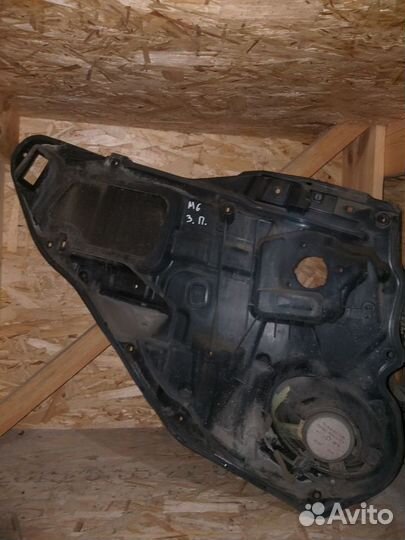 Обшивка двери Mazda 6gg