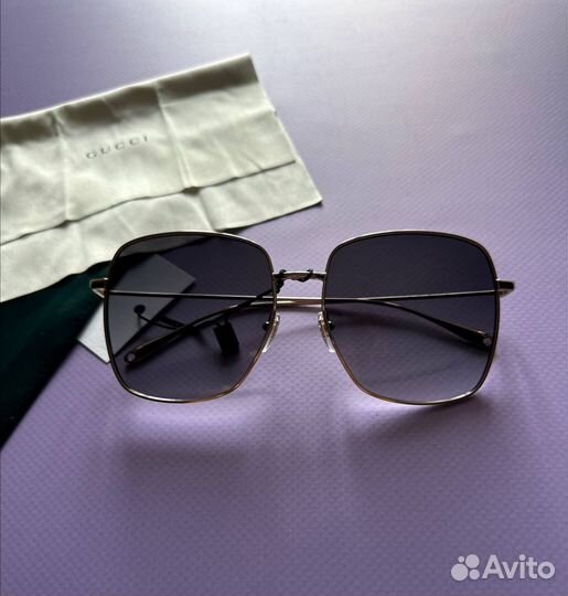 Солнцезащитные очки Gucci