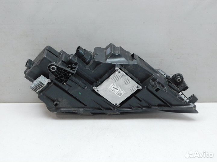 Фара левая Skoda Octavia