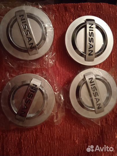 Заглушки на литые диски nissan
