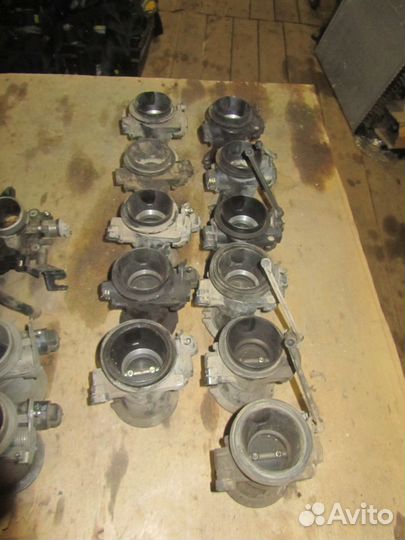 Заслонка дроссельная механическая Renault Logan