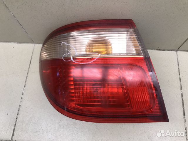 Фонарь задний наружный левый Almera N16 2000-2006