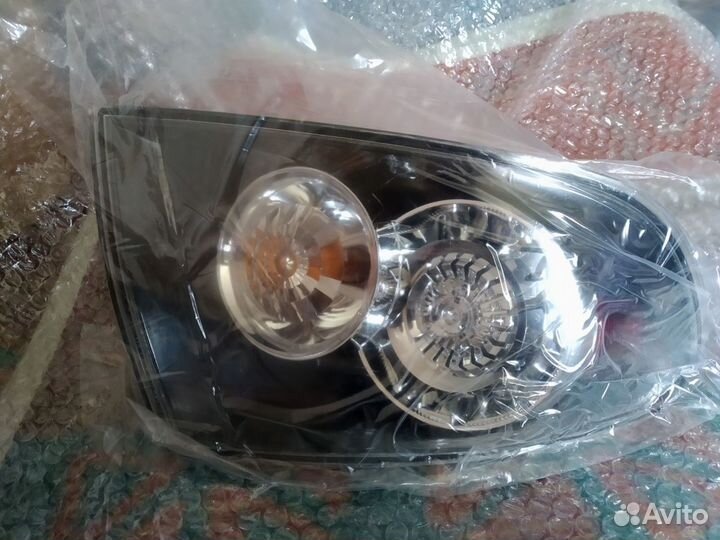 Фонарь задний светодиодный левый Мазда 3 вк седан