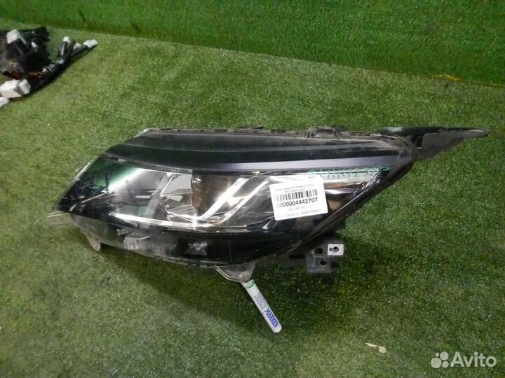 Фара левая Mitsubishi L200