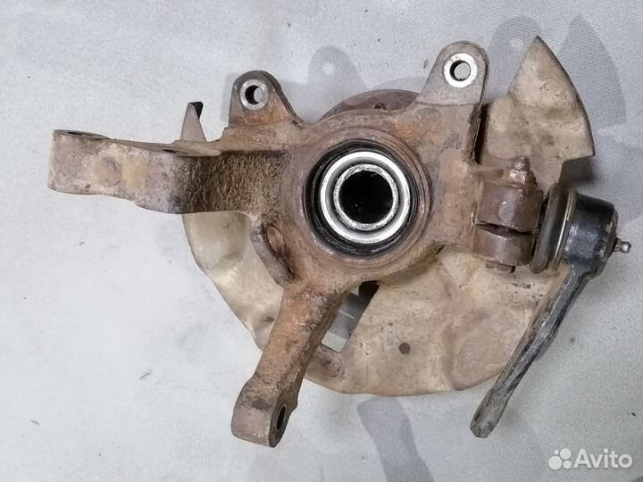 Кулак поворотный передний Kia Shuma 1996-2001