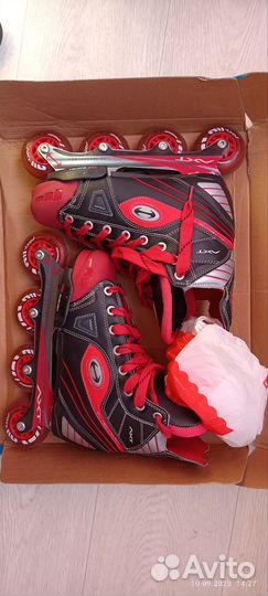 Роликовые коньки