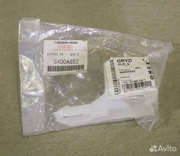 Кронштейн бампера переднего правый Mitsubishi Lanc