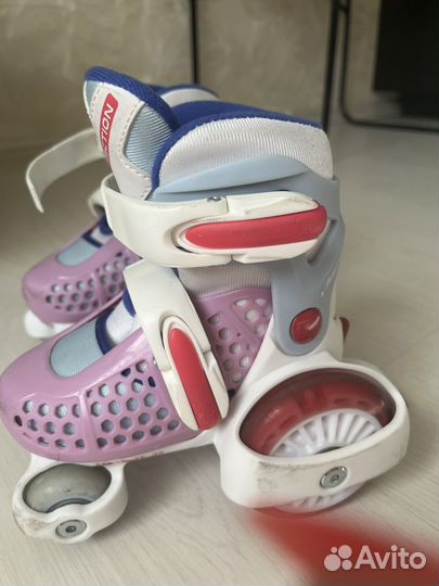 Роликовые коньки