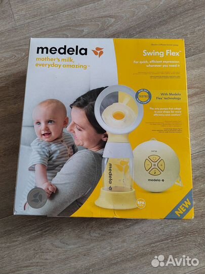 Молокоотсос medela электрический