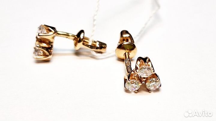 Золотые серьги с камнем